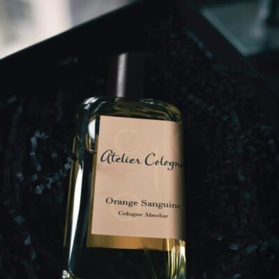 Stylish Atelier Cologne Orange Sanguine bottle elegantly placed in a gift box, perfect for luxury product showcases.